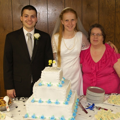 Aunt Debbie with the wedding cakes she made for my siblings and me